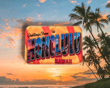 Load image into Gallery viewer, Vintage-style 'Greetings from Honolulu, Hawaii' postcard design dog ID tag with palm trees and sunset.