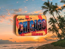 Load image into Gallery viewer, Chicago Illinois vintage postcard design dog ID tag  with beach and palm trees at sunset on the background. 
