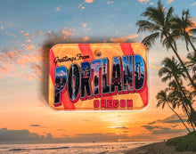 Load image into Gallery viewer, Vintage-style 'Greetings from Portland, Oregon' postcard design dog ID tag with a beach and palm trees in the background.

